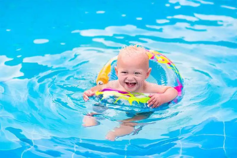 Baby in a swimming pool stock photo. Image of leisure ...
